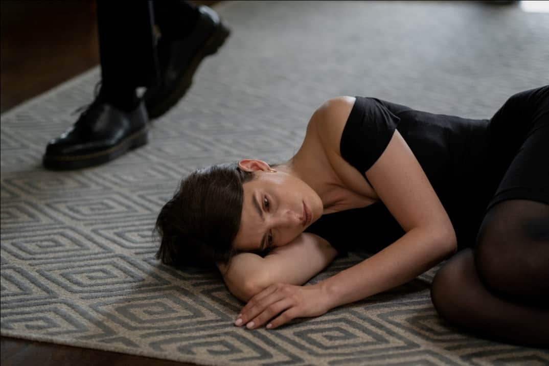 A woman lying on the floor